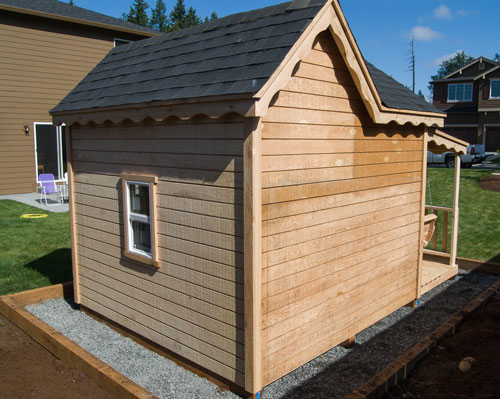 Image of back side of outdoor playhouse